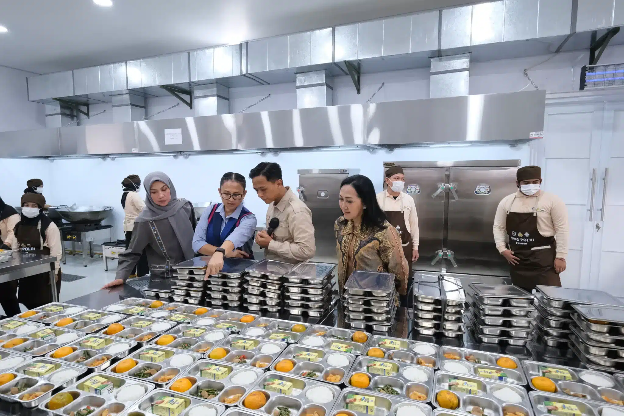 uji coba program Makan Bergizi Gratis (MBG) di dua lokasi. (Hms for BacainD.com)