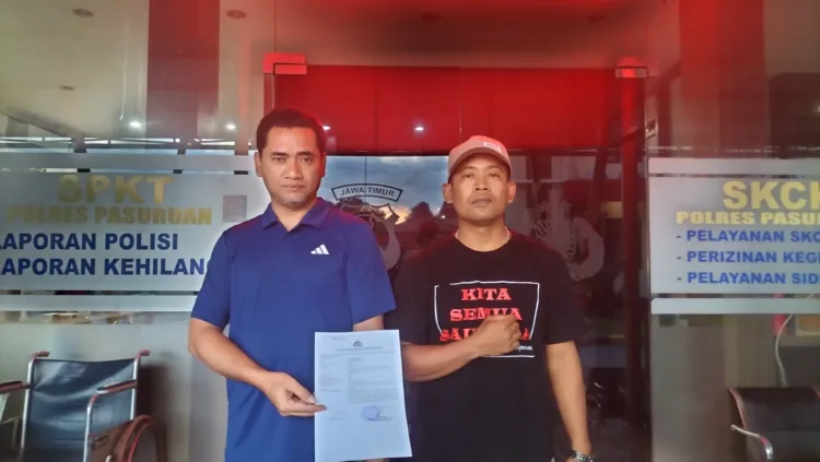 Korban didampingi LSM GMBI Pasuruan melaporkan perusakan Mobil (BM)